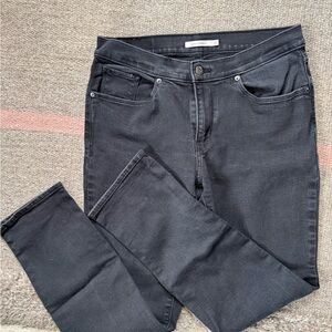 Levi's Women's distressed, black Straight Leg Jeans